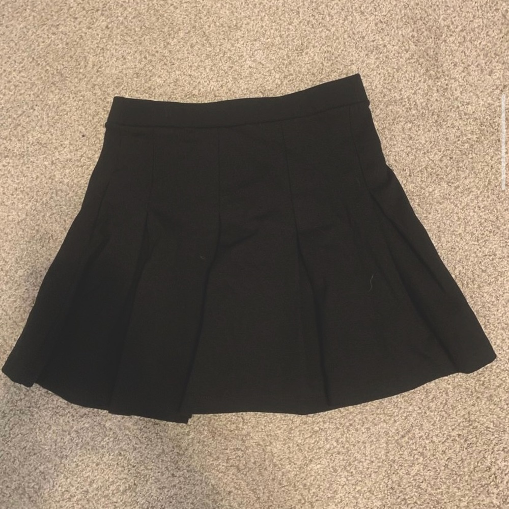 black pleated mini skirt